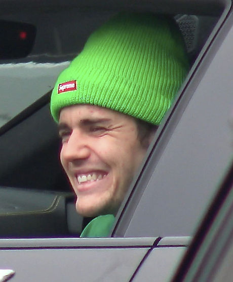 Justin Bieber Cruises In His Lambo While Sporting Bright Green Supreme  Beanie 